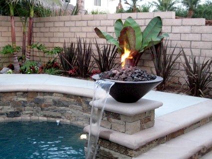 How Can I Incorporate A Fire Pit Into A Backyard Water Feature?