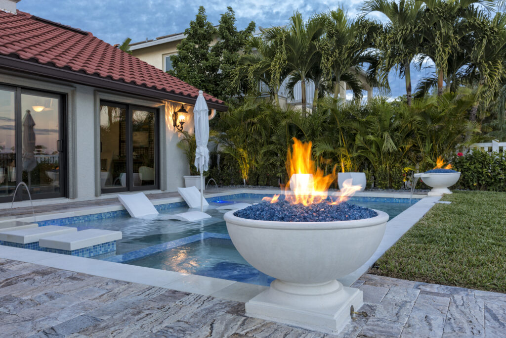 How Can I Incorporate A Fire Pit Into A Backyard Water Feature?