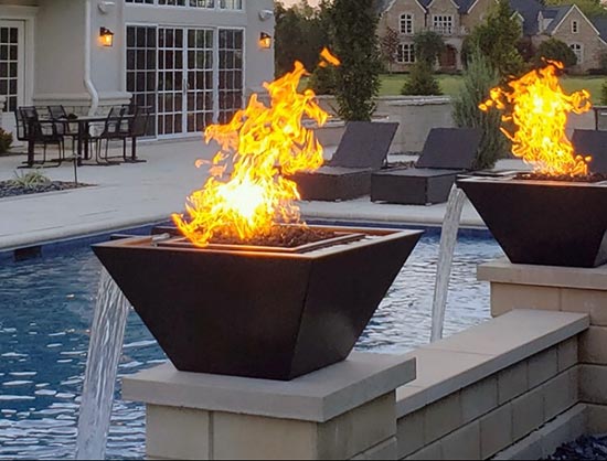 How Do I Add A Water Feature Element To My Fire Pit Area?