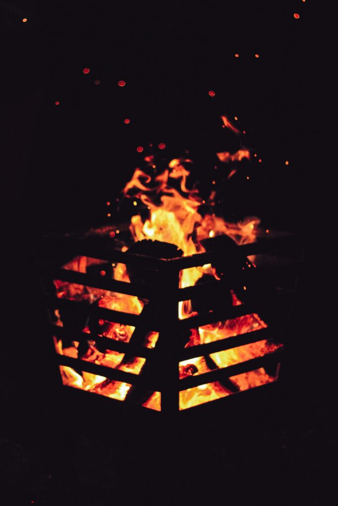 Are There Wood Fire Pit Designs That Incorporate Seating?